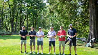 Program coordinator posts with Bateman Alum